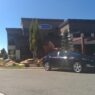 Bulletproof Chevy Volt in front of Armormax Utah facility